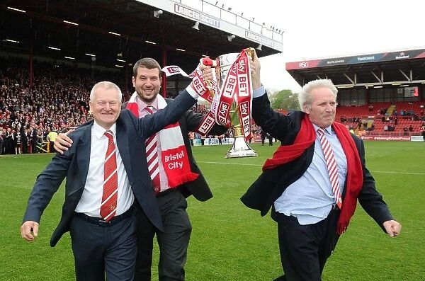 Bristol City Football Club: Steve Lansdown, Jon Lansdown, and Keith Dawe Celebrate Sky Bet League One Victory with the Trophy