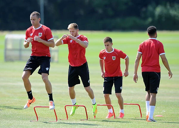 Bristol City Football Club: Training Sessions in July 2014 - Wilbraham, Burns, and Bryan in Action