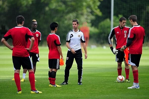 Bristol City Football Club: Under-21s Coach Alex Russell Guides Young Players During Training