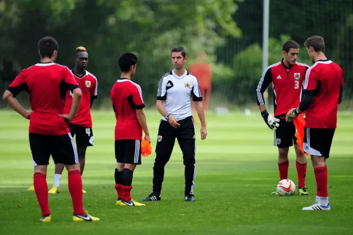 Framed Print : Bristol City Football Club: Under-21s Coach Alex Russell Guides Young Players During Training Framed Print : Bristol City Football Club: Under-21s Coach Alex Russell Guides Young Players During Training