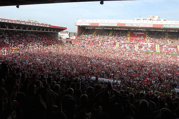 Bristol City Football Club: Unforgettable Moment of Promotion - Thrilled Fans Invade the Pitch