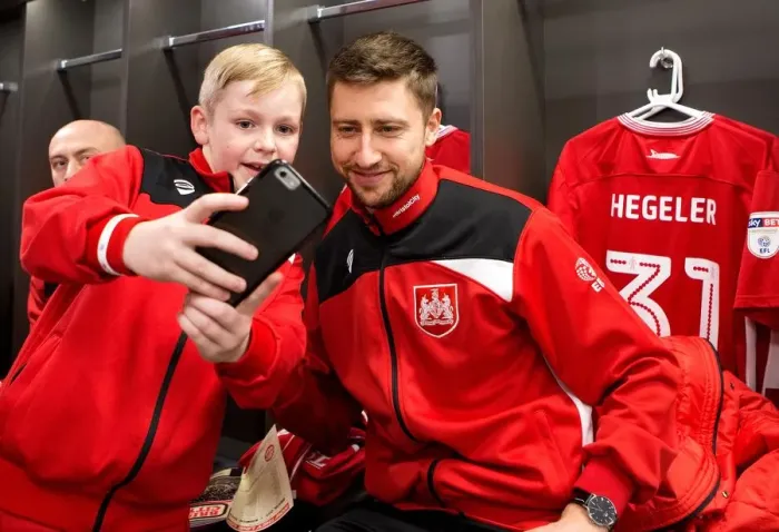 Framed Print : Bristol City Football Club: Uniting Mascots and Players in the Dressing Room