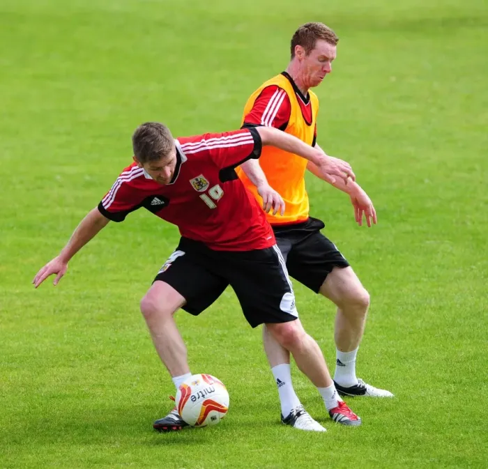 Framed Print : Bristol City Football Club: Wilson vs. Pearson - A Battle for the Ball during Pre-Season Training Framed Print : Bristol City Football Club: Wilson vs. Pearson - A Battle for the Ball during Pre-Season Training