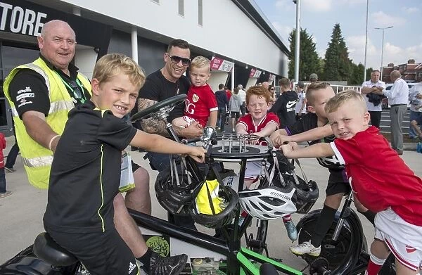 Bristol City Football Fans Support Children's Hospice South West with Seven-Seater Bike Demonstration at Ashton Gate Stadium