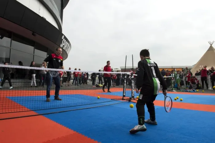 Framed Print : Bristol City Football Match: Children Play Tennis with Community Trust Amidst the Action