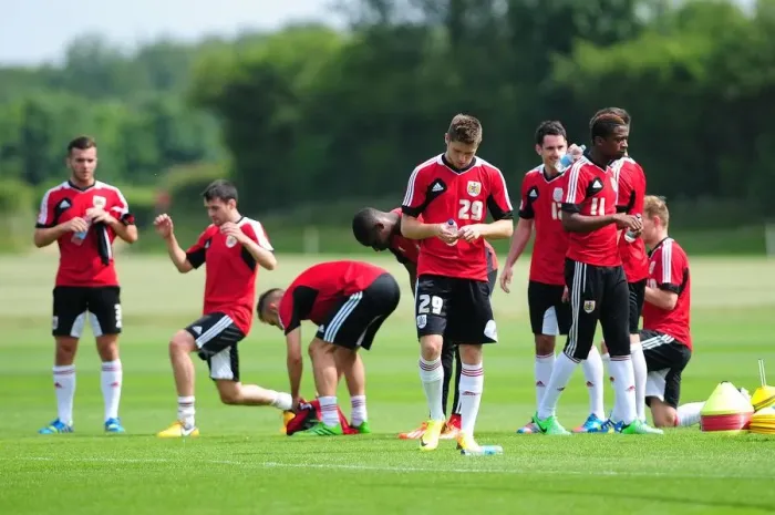 Framed Print : Bristol City Football Squad at Pre-Season Training: A Moment of Relaxation