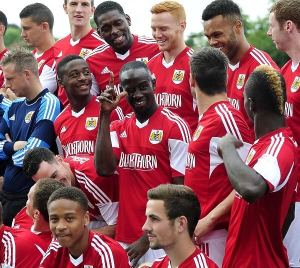 Bristol City Football Team: Albert Adomah's Expressive Moment at the Team Photo Shoot
