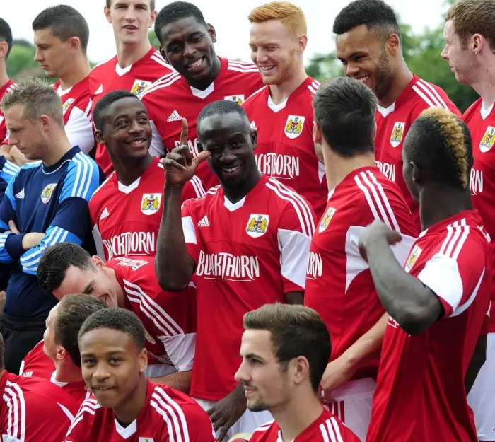 Framed Print : Bristol City Football Team: Albert Adomah's Expressive Moment at the Team Photo Shoot
