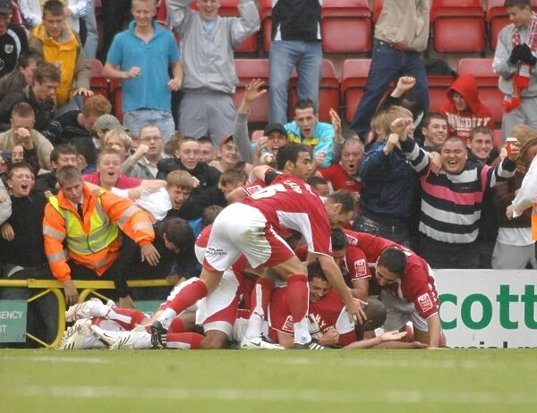 Bristol City Football Team in Euphoric Group Celebration After Win Against Sheffield United