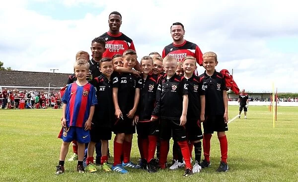 Bristol City Footballers Jonathan Kodjia and Lee Tomlin Engage with Young Fans at Hengrove Athletic Pre-season Match