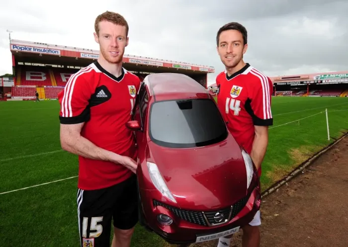 Framed Print : Bristol City Footballers Stephen Pearson and Cole Skuse with Wessex Garages Baby Duke at Pre-Season Open Day Framed Print : Bristol City Footballers Stephen Pearson and Cole Skuse with Wessex Garages Baby Duke at Pre-Season Open Day