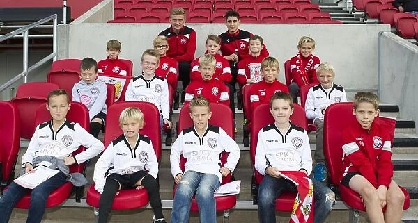 Bristol City Footballers Taylor Moore and Callum O'Dowda with Portishead Town Young Players at Ashton Gate Stadium (Bristol City vs Nottingham Forest, Sky Bet Championship)