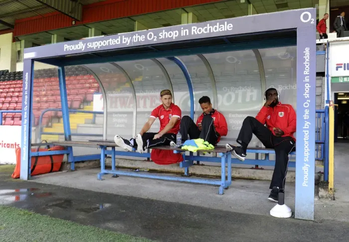Framed Print : Bristol City Footballers Wes Burns, Bobby Reid, and Karleigh Osborne on the Bench at Rochdale's Spotland Stadium during Sky Bet League One Match