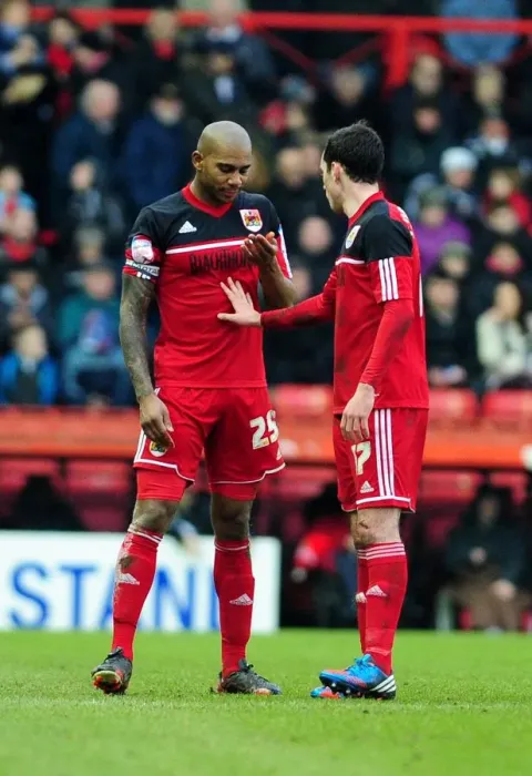 Framed Print : Bristol City: Gregg Cunningham Consoles Marvin Elliott Amidst Nosebleed on Pitch (Bristol City V Nottingham Forest, 2013) Framed Print : Bristol City: Gregg Cunningham Consoles Marvin Elliott Amidst Nosebleed on Pitch (Bristol City V Nottingham Forest, 2013)