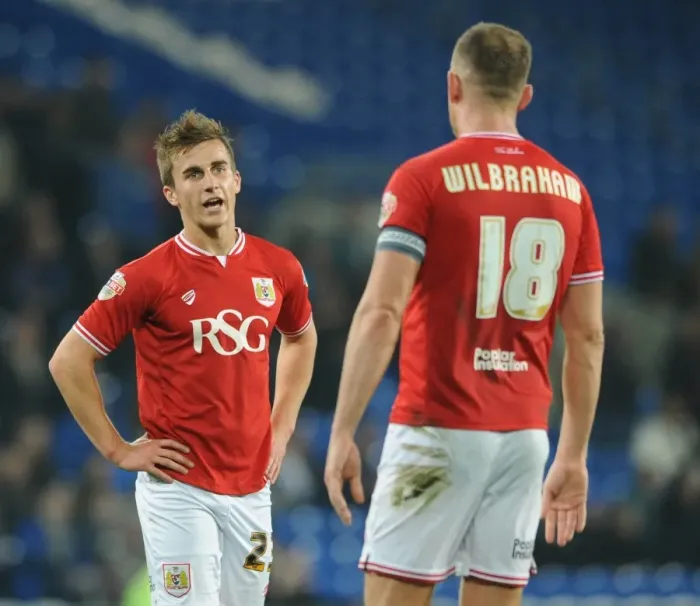 Framed Print : Bristol City: Joe Bryan and Aaron Wilbraham in Deep Conversation at Cardiff City Stadium, 2015