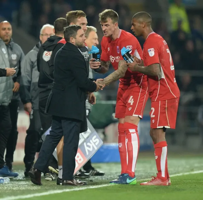 Framed Print : Bristol City: Johnson and Players in Deep Discussion during Cardiff Clash