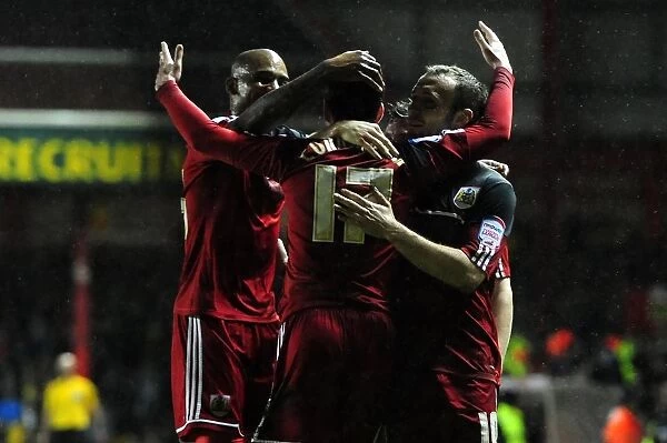 Bristol City Leads 2-0 over Watford: Paul Anderson's Strike Celebrated by Gregg Cunningham