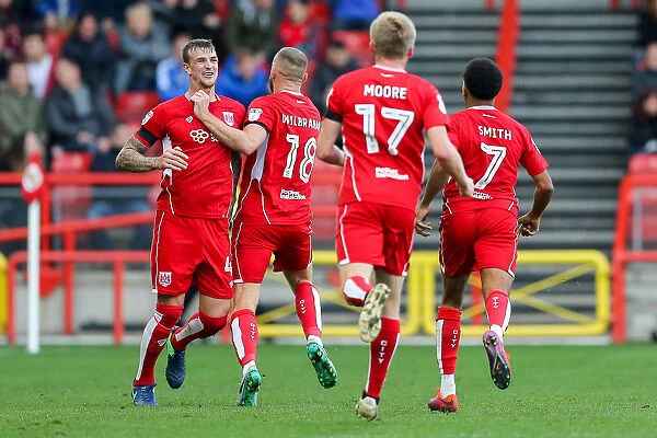 Bristol City Leads Blackburn Rovers: Aden Flint and Aaron Wilbraham Celebrate First Goal