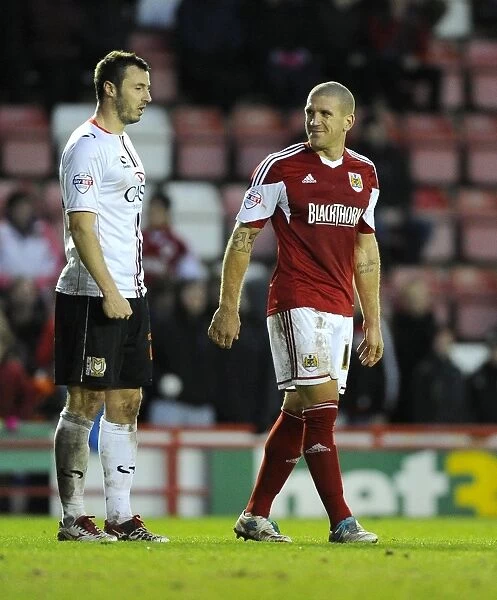 Bristol City: A Light-Hearted Moment Between Rivals El-Abd and Carruthers during Bristol City vs MK Dons