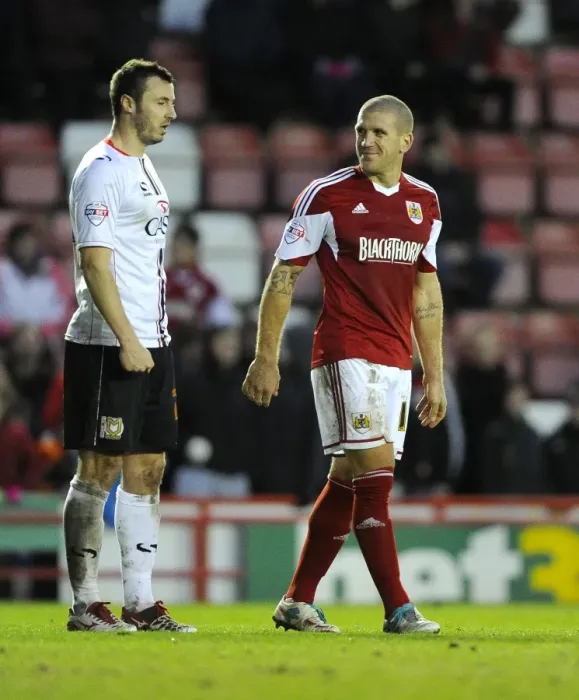 Framed Print : Bristol City: A Light-Hearted Moment Between Rivals El-Abd and Carruthers during Bristol City vs MK Dons Framed Print : Bristol City: A Light-Hearted Moment Between Rivals El-Abd and Carruthers during Bristol City vs MK Dons