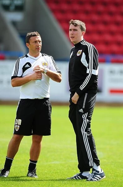 Bristol City Manager Derek McInnes Engages with Analyst Stewart Dougall during Pre-Season Training, July 2012