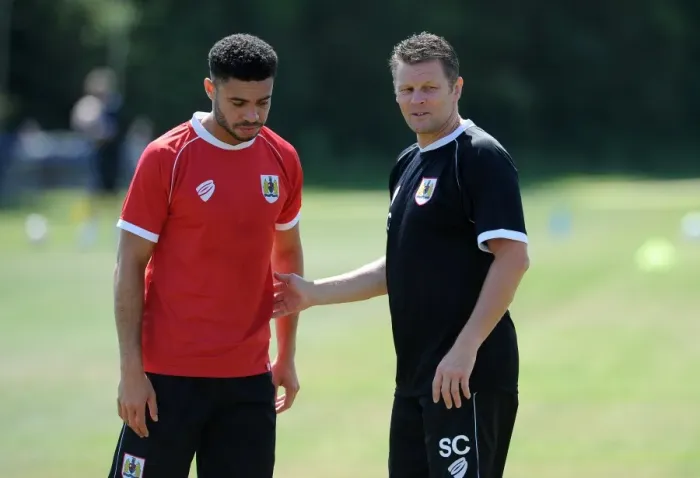Framed Print : Bristol City Manager Engages with Derrick Williams during Pre-Season Training (July 2014) Framed Print : Bristol City Manager Engages with Derrick Williams during Pre-Season Training (July 2014)