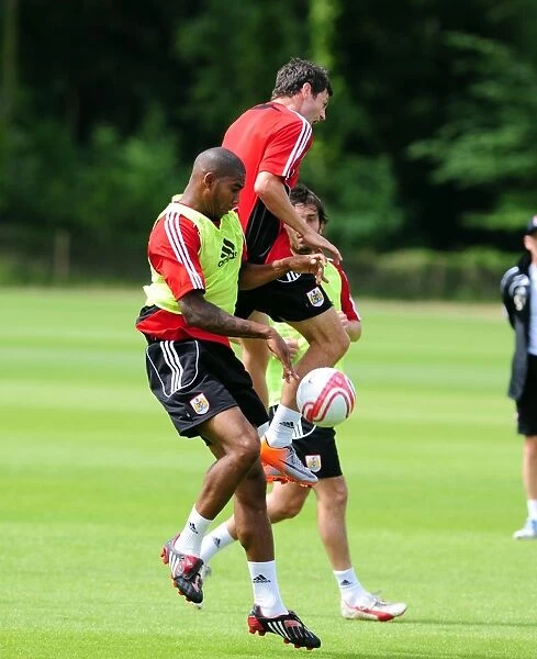 Bristol City: Marvin Elliott and Ivan Sproule Contesting for the Aerial Ball during Pre-Season Training