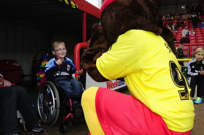 Framed Print : Bristol City Mascot Greets Young Fan at Ashton Gate during Bristol City vs Colchester United (Sky Bet League One)