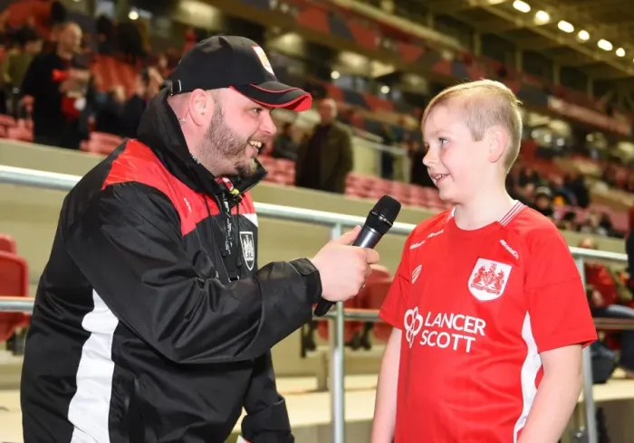 Framed Print : Bristol City Mascot Interviewed by Announcer Ian Downs Before Face-Off Against Norwich City at Ashton Gate
