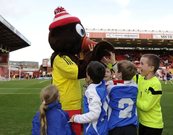 Framed Print : Bristol City Mascot Scrumpy Delights Young Fans at Ashton Gate during Bristol City vs Gillingham Match Framed Print : Bristol City Mascot Scrumpy Delights Young Fans at Ashton Gate during Bristol City vs Gillingham Match