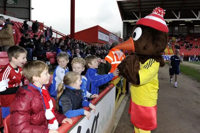Framed Print : Bristol City Mascot, Scrumpy, Engages with Young Fans at Ashton Gate during Bristol City vs Gillingham Match, Sky Bet League One Framed Print : Bristol City Mascot, Scrumpy, Engages with Young Fans at Ashton Gate during Bristol City vs Gillingham Match, Sky Bet League One