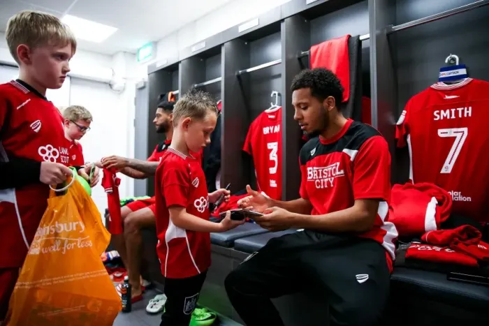 Framed Print : Bristol City Mascots Join Players for Pre-Match Huddle at Ashton Gate Stadium