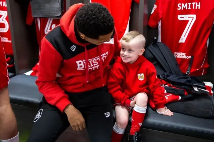 Framed Print : Bristol City Mascots and Players Unite in the Dressing Room Framed Print : Bristol City Mascots and Players Unite in the Dressing Room