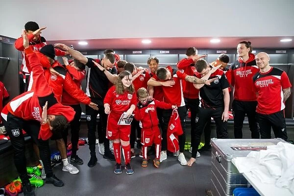 Bristol City Mascots and Players Unite in the Dressing Room
