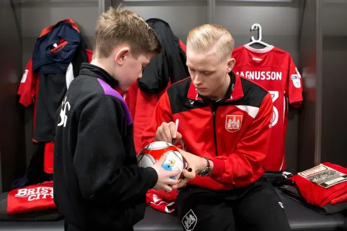 Framed Print : Bristol City: Mascots and Players Unite in the Dressing Room