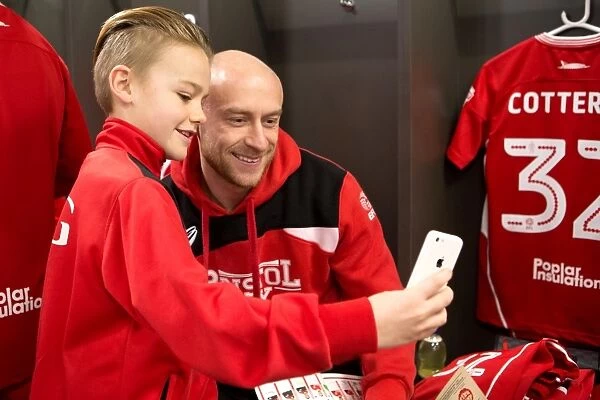 Bristol City: Mascots and Players Unite in the Dressing Room