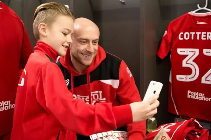 Framed Print : Bristol City: Mascots and Players Unite in the Dressing Room