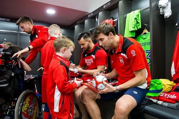 Bristol City Mascots and Players in Unity: Sky Bet Championship Dressing Room Encounter