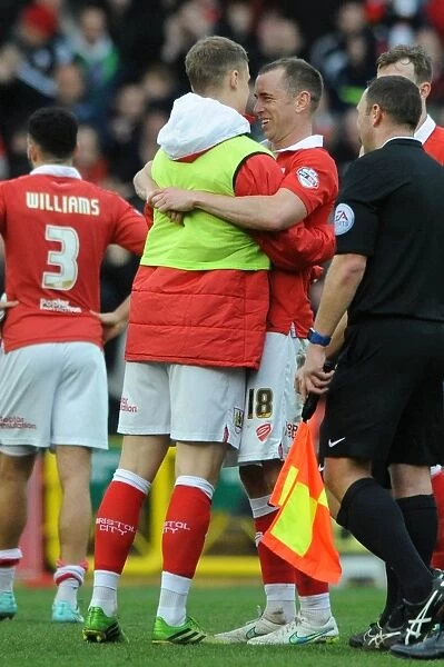 Bristol City: Matt Smith and Aaron Wilbraham Embrace Victory After Bristol City v Rochdale FC (February 2015)