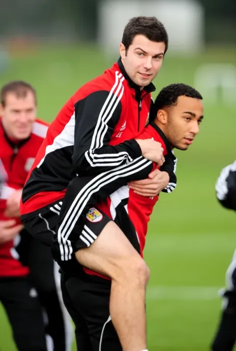 Framed Print : Bristol City: Maynard and Foster in Deep Focus during Training Session Framed Print : Bristol City: Maynard and Foster in Deep Focus during Training Session