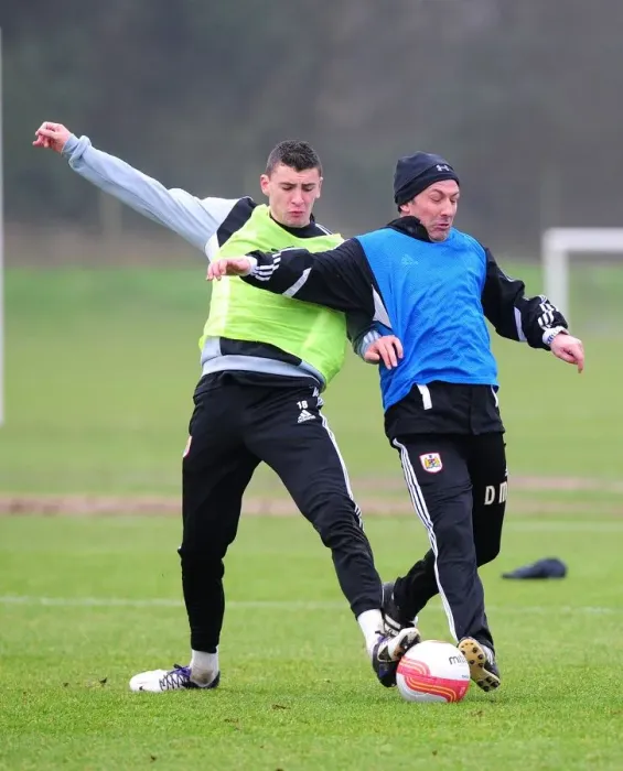 Framed Print : Bristol City: McInnes and Wilson Go Head-to-Head in Intense Training Drill