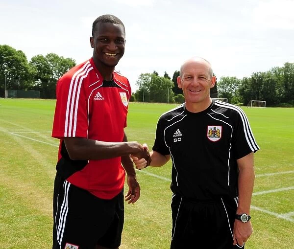 Bristol City New signing Kalifa Cisse with Bristol City Manager, Steve Coppell