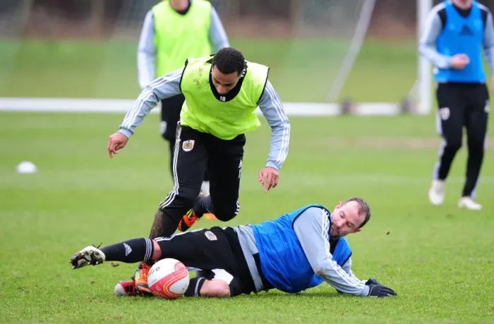 Framed Print : Bristol City: Nicky Maynard and Louis Carey in Intense Training Battle Framed Print : Bristol City: Nicky Maynard and Louis Carey in Intense Training Battle