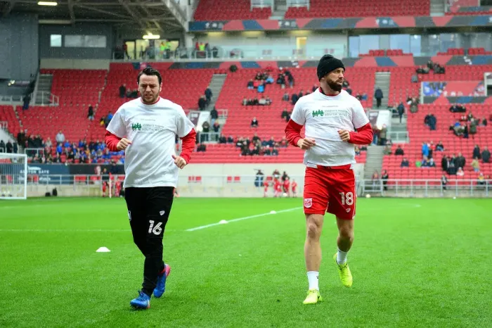 Framed Print : Bristol City Players Aaron Wilbraham and Lee Tomlin Show Support for Children's Hospice South West during Sky Bet Championship Match against Burton Albion