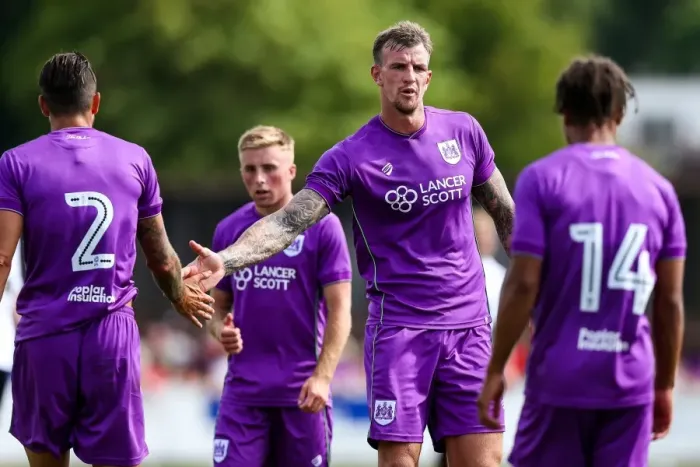 Framed Print : Bristol City Players Aden Flint, Eros Pisano, and Bobby Reid Celebrate after Pre-season Friendly Match vs. Bristol Manor Farm (2017)