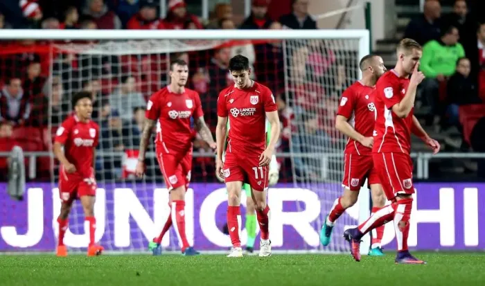 Framed Print : Bristol City Players Show Disappointment After Conceding Goal to Hull City