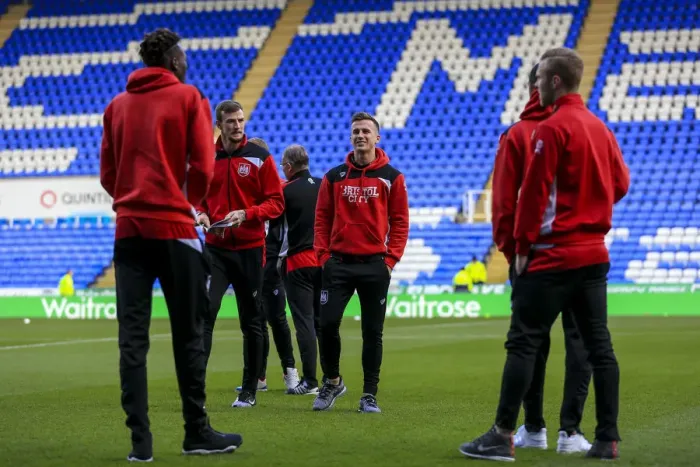 Framed Print : Bristol City Players Evaluating Reading's Pitch Before Sky Bet Championship Match - November 2016