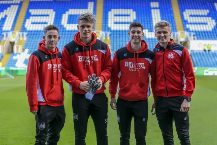 Framed Print : Bristol City Players Examine Reading's Pitch Before Sky Bet Championship Clash Framed Print : Bristol City Players Examine Reading's Pitch Before Sky Bet Championship Clash