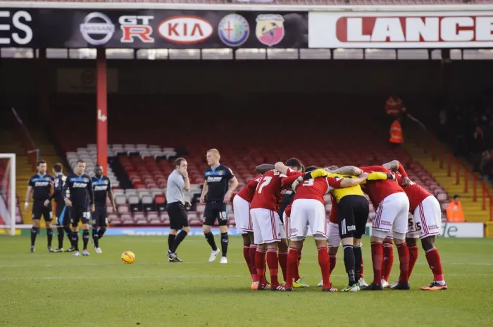 Framed Print : Bristol City Players Huddle Before Sky Bet League One Match Against Stevenage