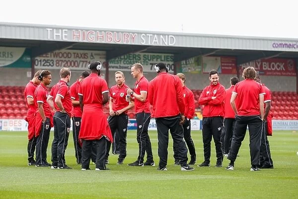 Bristol City Players Inspecting the Pitch at Fleetwood Town's Highbury Stadium (2014)
